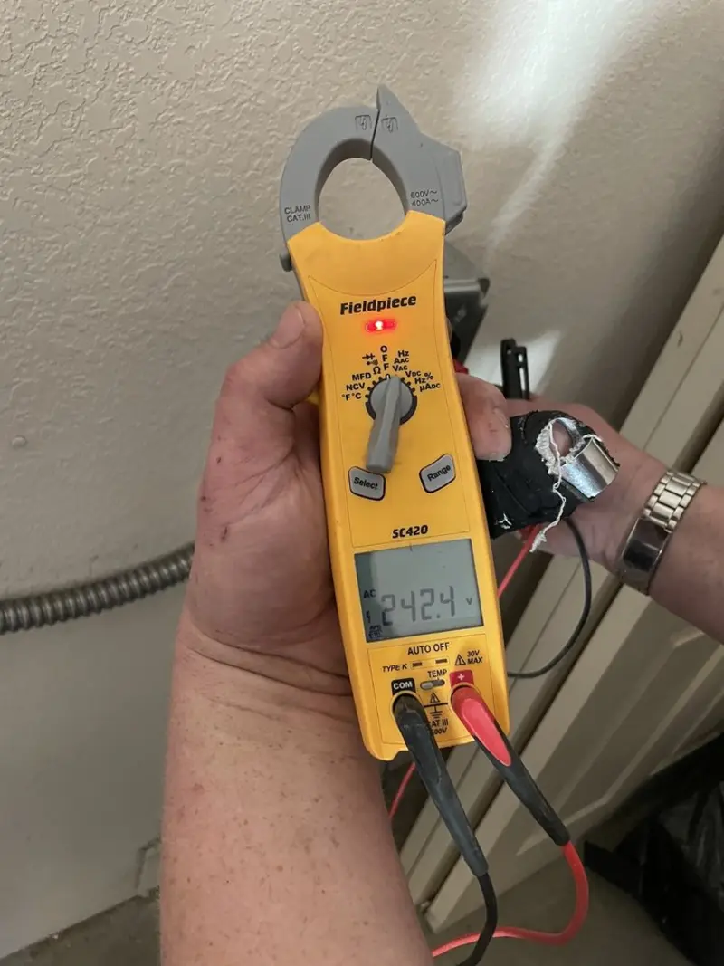Voltage testing with clamp meter during Electrical Installation Services in Hillsboro